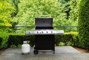 gas barbecue grill in backyard