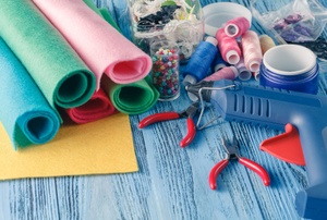 A collection of craft supplies including rolls of felt.