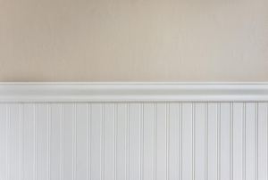 Wainscoting against a beige wall