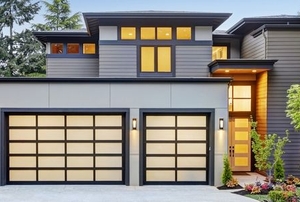 a house with screen-door style garage doors