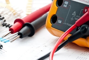 The black and red probes of an ordinary multimeter.