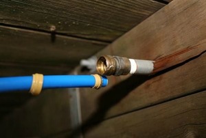 A broken SharkBite PEX connection.