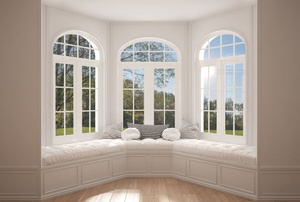 large bay window with white seating cushions