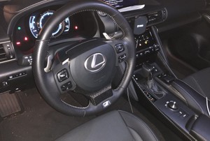 the steering wheel and dash of a car