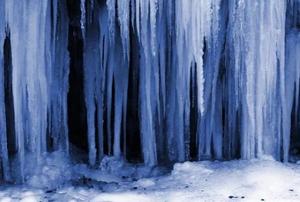 A close-up of a large collection of icicles.