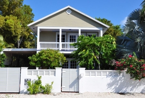 A two-story home with an attached carport.
