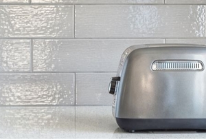 metal toaster on a Concrete Counter