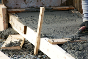 boards holding in a cement foundation