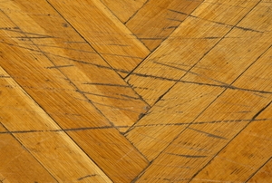 a hardwood floor with scratches