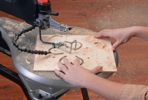 using scroll saw to cut wood