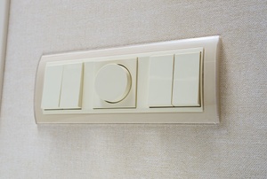 a dimmer switch on a wall