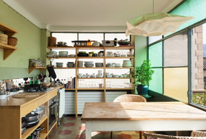 A sleek modern kitchen with lots of storage.