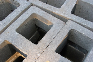 Concrete blocks sit in neat stacks.
