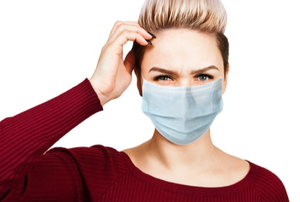 confused woman in face mask