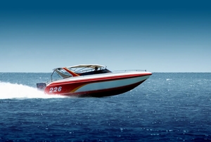 a red boat on the water