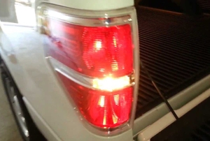 turn signal light on the back corner of a vehicle