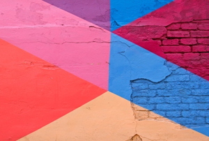 A bright colorful geometric wall .
