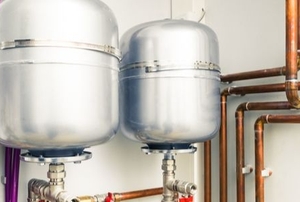 Metal hot water tanks.