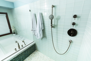 bathroom with wall shower controls