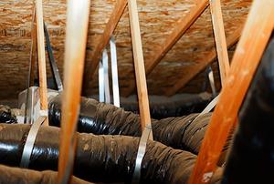 Heating ducts running in an attic.