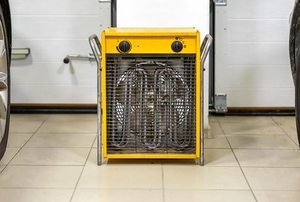 electric heater in a garage between cars