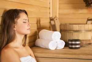 Woman resting in a sauna