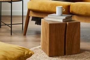 wood cube coffee table in room with natural colors
