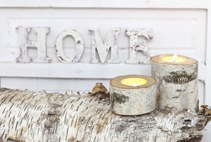 A set of small birch wood candles.