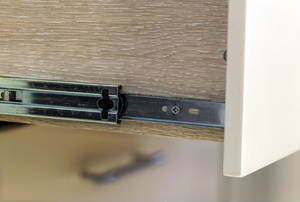 A close-up image of a drawer glide.
