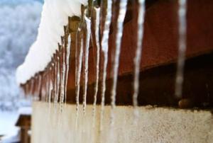 Icicles hanging from a gutter.