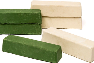 white and green blocks of polishing wax