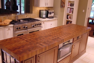 Butcher block table top in a kitchen.