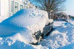 Vehicle buried in snow