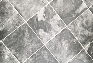 A gray vinyl floor with square pattern.