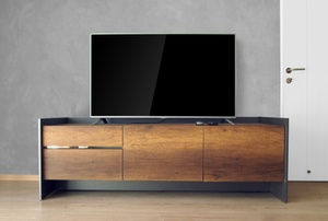 A TV on a set of drawers