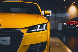 the front of a yellow car