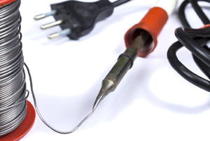A soldering iron and wire.