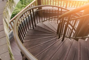 wood spiral staircase in exterior space