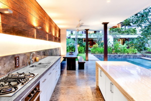 outdoor kitchen space with cool lighting and design