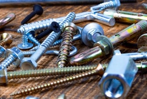 different kinds of screws on a table