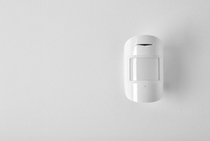 A motion sensor on a white background.