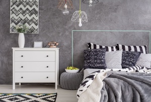 A bedroom with Venetian plaster walls.