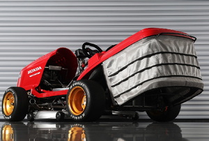 Red ride-on lawn mower