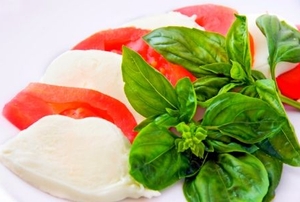 Caprese salad: mozzarella, tomatoes and basil.