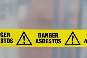 A sign that says "Danger Asbestos."