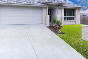 house with concrete driveway