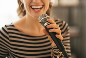 A girl sings.