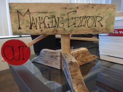 Managing editor sign