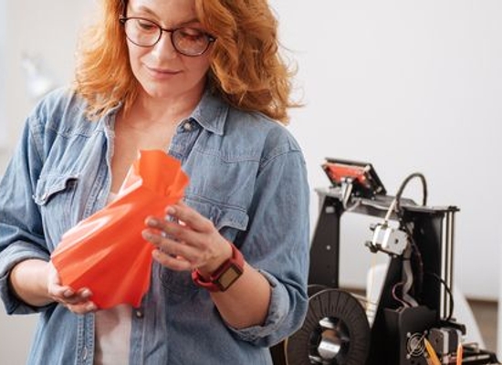 person holding 3d printed vase