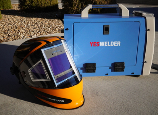 YesWelder machine with protective helmet